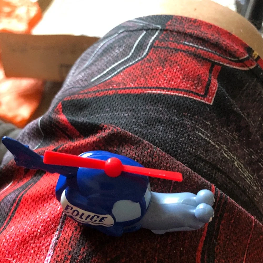 Blue Toy Helicopter with Red Rotor